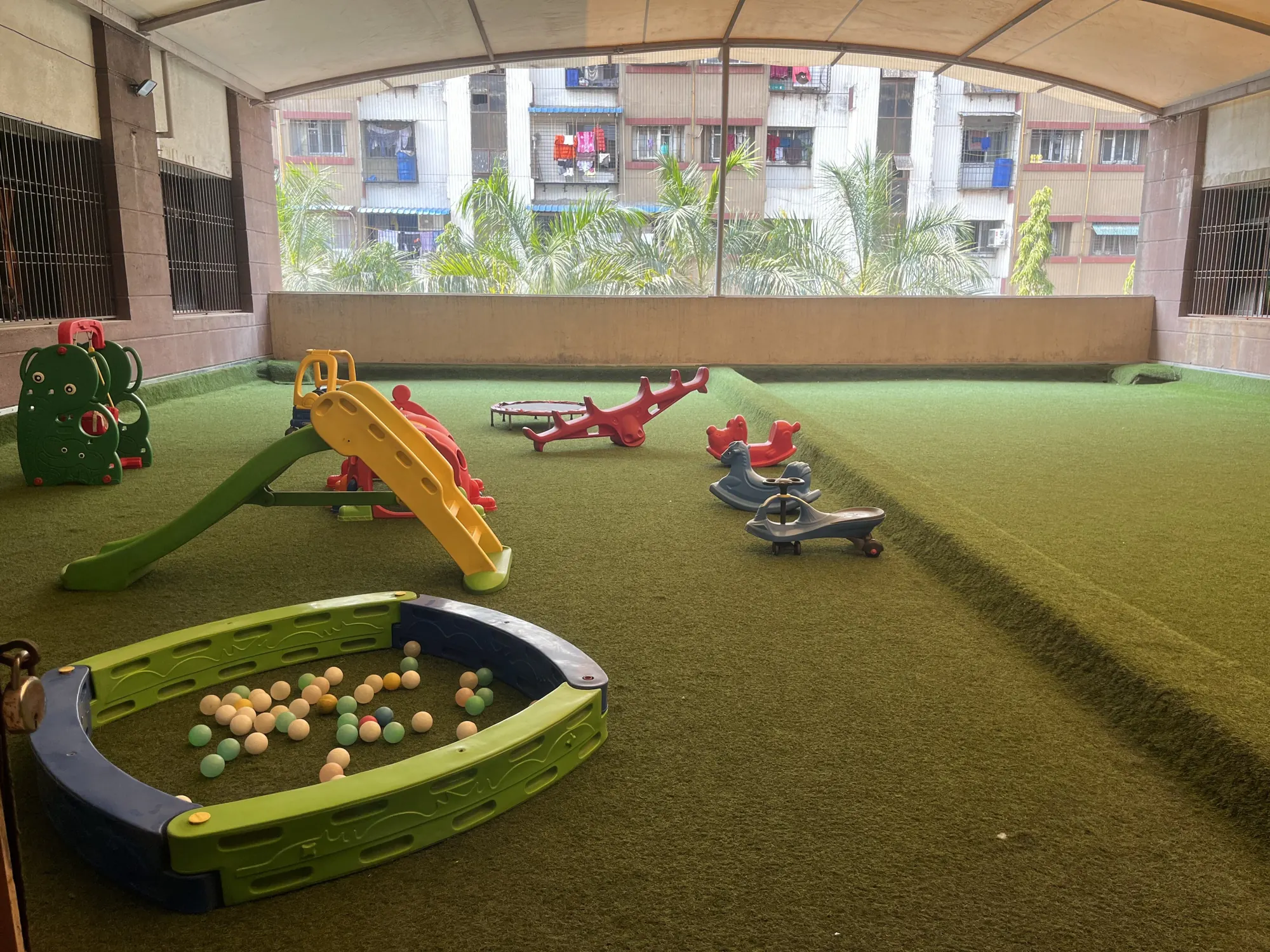 The pre-primary play area with slides and a ball pit