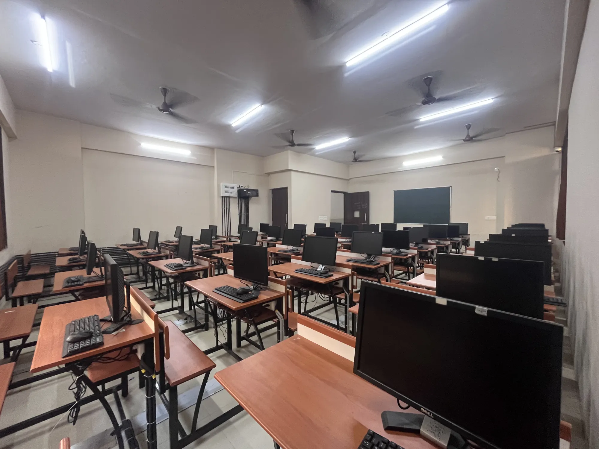 The computer lab with rows of workstations