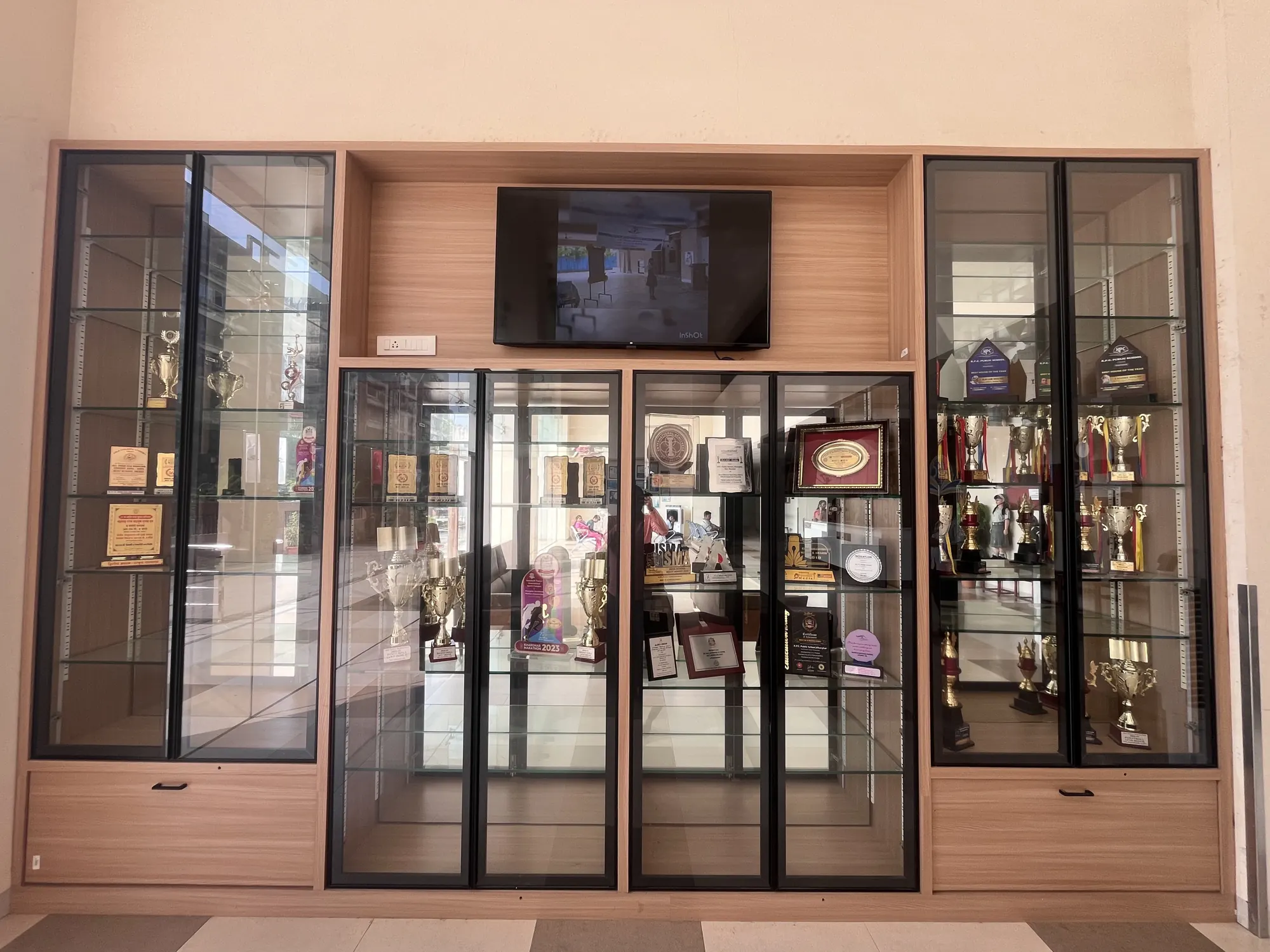 Glass cabinets of trophies and awards