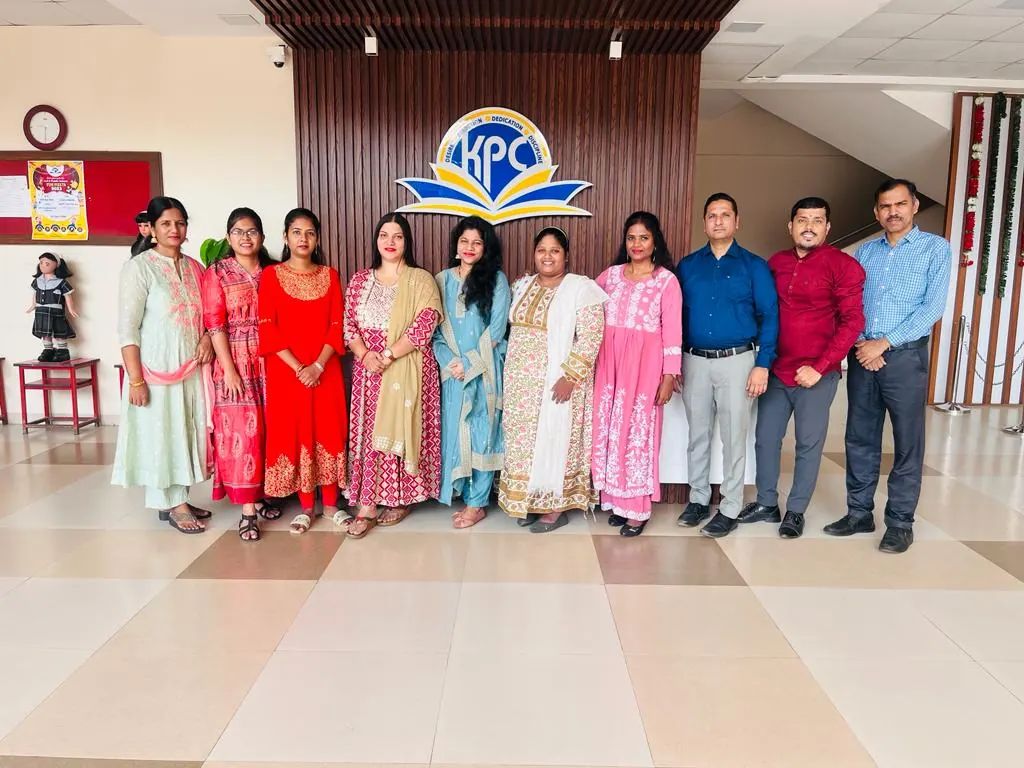 KPC teachers and staff in the school foyer